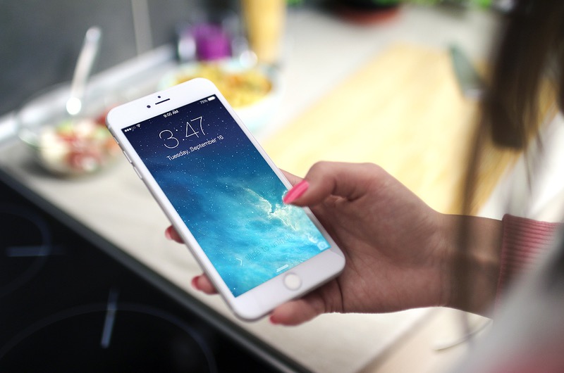 Woman Holding iPhone