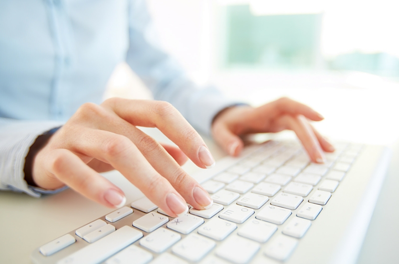 Close up of Woman Typing
