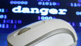 Computer Mouse Danger Text and Binary in Background