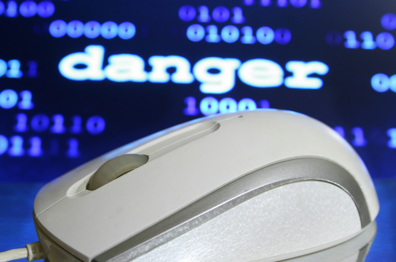 Computer Mouse Danger Text and Binary in Background
