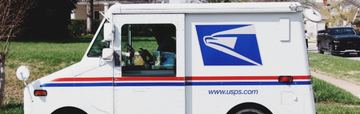 USPS Truck Parked in Front of a Home