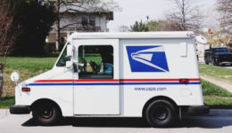 USPS Truck Parked in Front of a Home