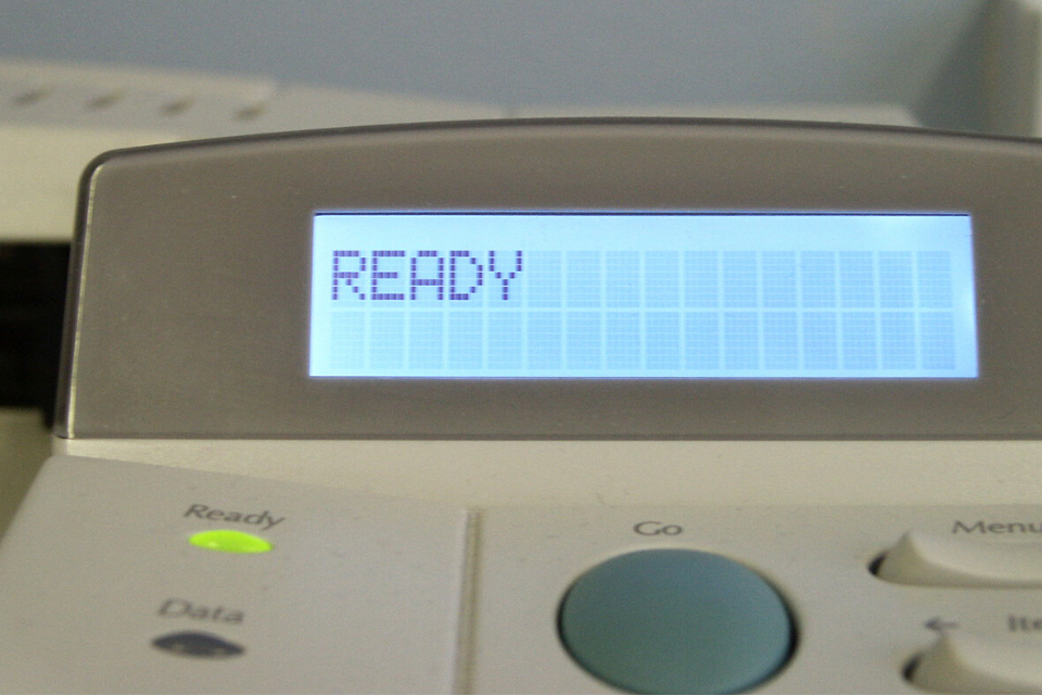 Closeup of the word READY printer screen